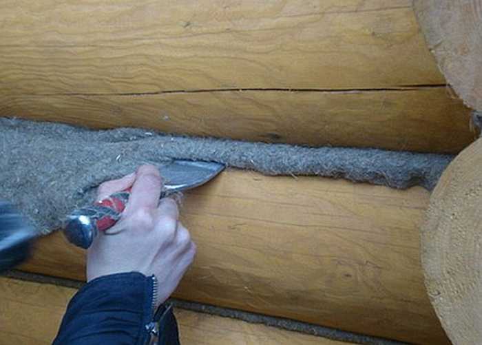 Конопатка бруса: чем и как правильно конопатить стены из профилированного бруса после усадки?