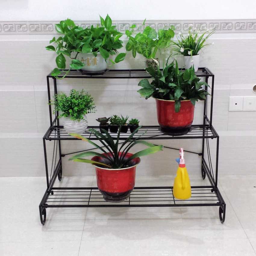 Напольная подставка для цветов (39 фото): выбираем высокую стойку на колесиках для больших комнатных растений, белые стеклянные угловые подставки в интерьере. особенности пластиковых моделей